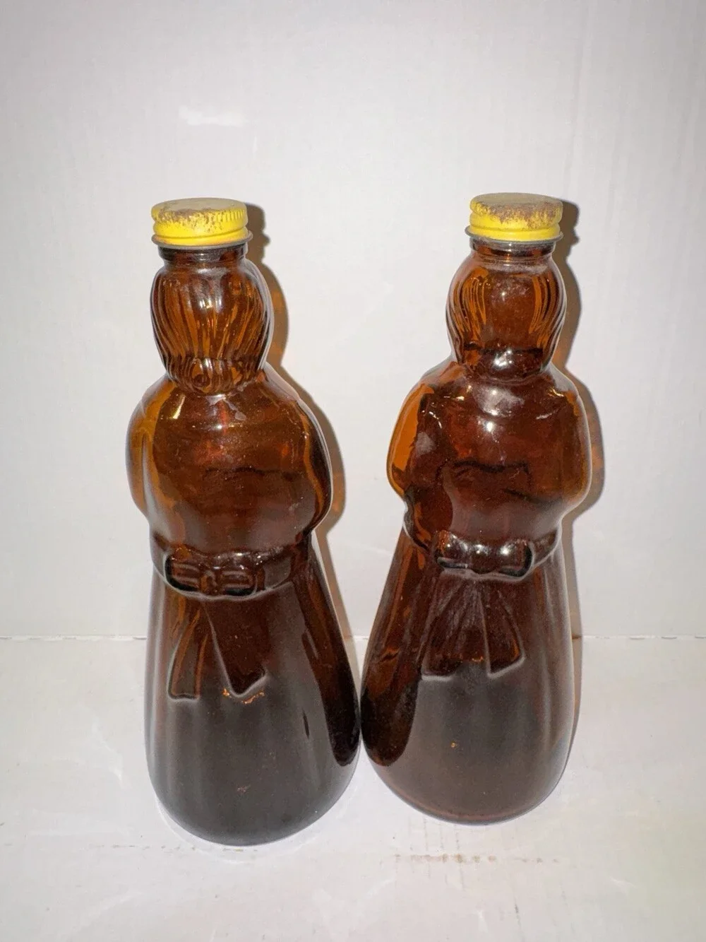 Vintage Mrs. Butterworth Amber Glass Syrup Bottles Pair Original Yellow Caps